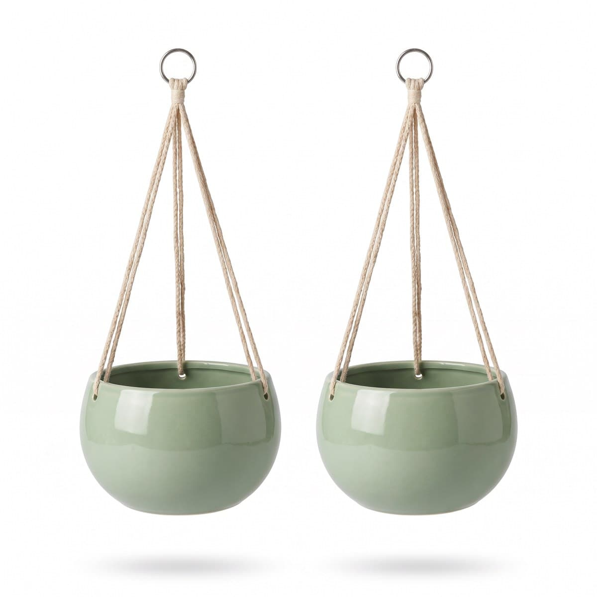 Two pale green glazed ceramic hanging pots, each on three cotton cords meeting at a metal ring
